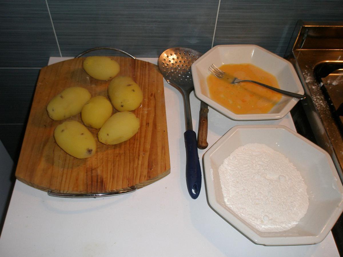 • Le patate bollite e sbucciate